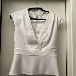 Bebe blouse in excellent condition- deep v-neck